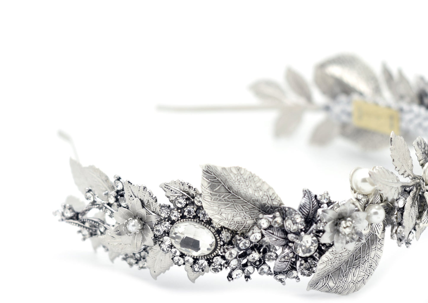 Adsumus Headpiece